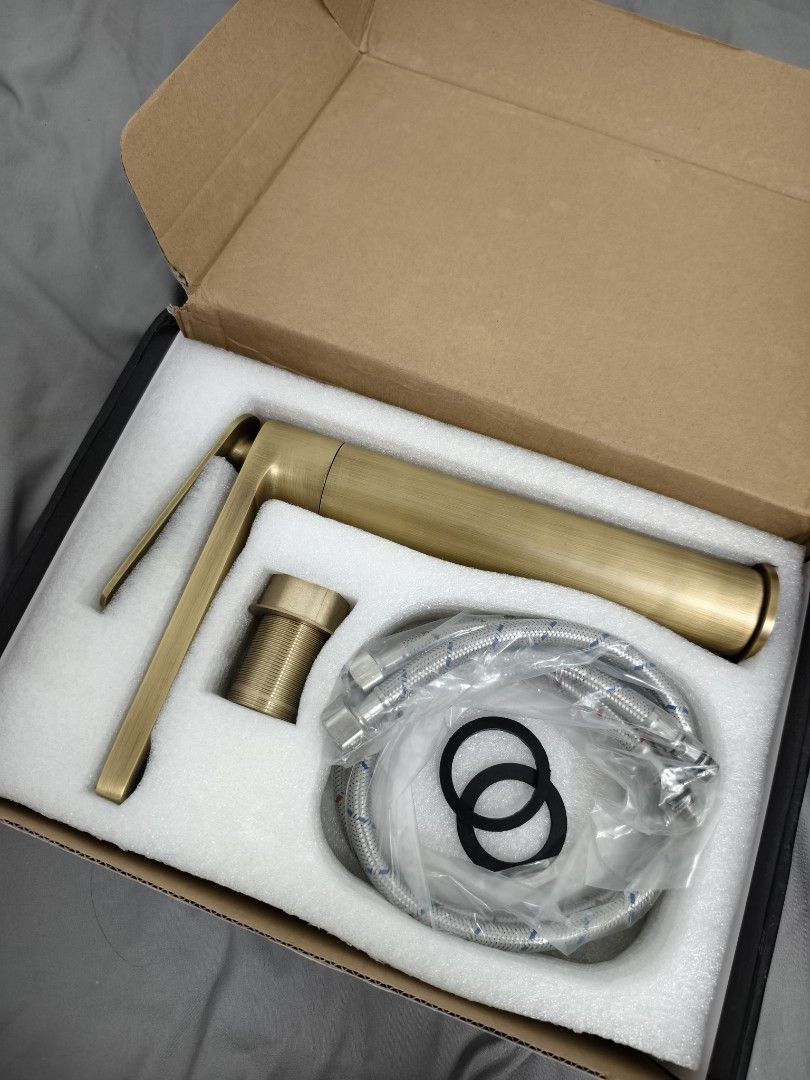 Brushed Brass Tall Basin Faucet Tap (Category: Bathroom & Kitchen Fixtures) located in Angeles City. Submitted by measaliman02351 (Listing ID 1468733587, Image 1). Description: - Elegant brushed brass finish - Tall basin tap with convenient single top lever - Includes two braided supply hoses, mounting hardware, and rubber washers - Brand new, never installed, and in clean condition - Packed securely in original protective foam box.