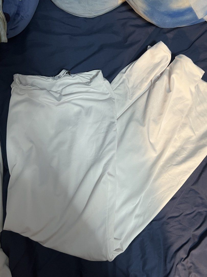 BSCO White Ruched Bodycon Skirt (Category: Skirts) located in Marikina City. Submitted by yssacee (Listing ID 1468921802, Image 3). Description: - Brand: BSCO (Made in Philippines) - Style: Midi length ruched bodycon dress - Color: Clean white - Material: Super stretchy, body-hugging fabric - Details: Flattering gathering down the sides for added texture - shipping from lower antipolo rizal.