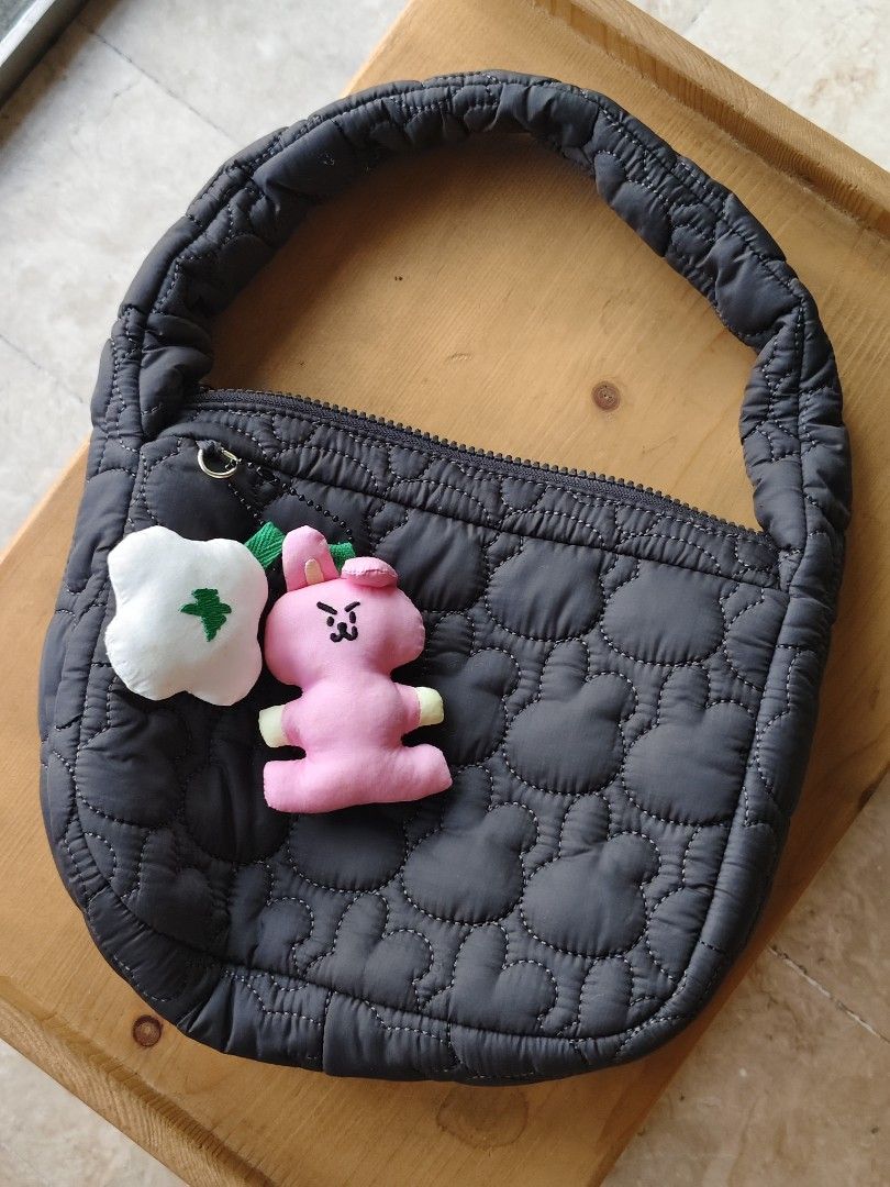 BT21 cooky bag (Category: K-Wave Merchandise) located in Paranaque City. Submitted by shopcadescloset (Listing ID 1468810984, Image 1). Description: BT21 Cooky Padded Hobo Bag from the Line Friends Winter Edition collection, featuring a quilted pattern styled after the character Cooky. - yellowing parts on white plush but i think it can be washed..