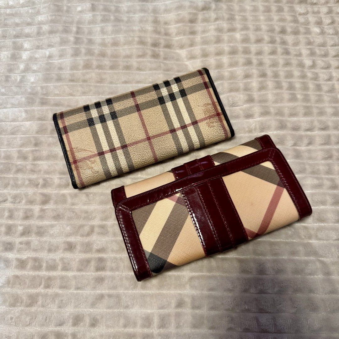 Burberry Check Long Wallets (BUNDLE SALE) (Category: Luxury Bags & Wallets) located in Quezon City. Submitted by kuiamoi (Listing ID 1468778045, Image 1). Description: - Set of 2 authentic Burberry long wallets in the iconic check canvas pattern - Wallet 1: Black leather interior with a secure zip coin compartment and cash slots - Wallet 2: Burgundy patent leather trim featuring card slots and a convenient ID window - Both wallets include multipl