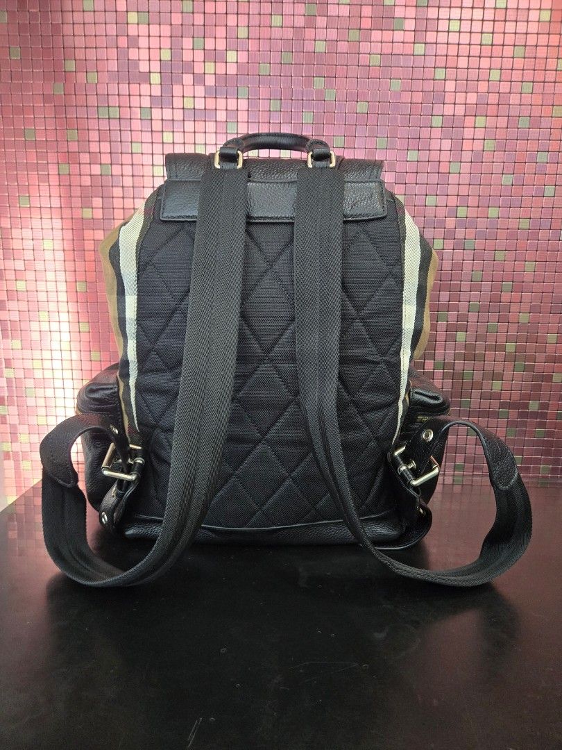 Burberry Leather Backpack Large size can fit laptop (Category: Luxury Bags & Wallets) located in Manila. Submitted by pr3l0v3it3ms (Listing ID 1468834992, Image 2). Description: Burberry Backpack YKK zipper,with burberry engrave on button front and back like new condition pure leather negotiable.