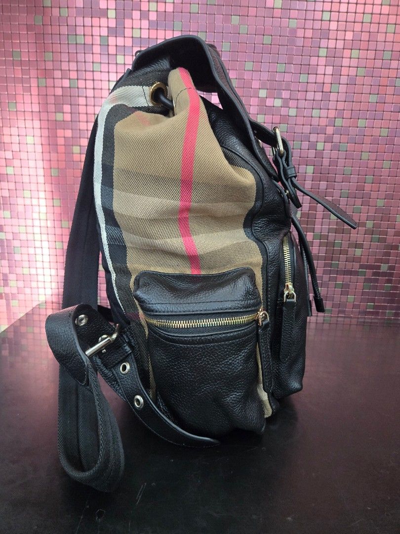 Burberry Leather Backpack Large size can fit laptop (Category: Luxury Bags & Wallets) located in Manila. Submitted by pr3l0v3it3ms (Listing ID 1468834992, Image 3). Description: Burberry Backpack YKK zipper,with burberry engrave on button front and back like new condition pure leather negotiable.