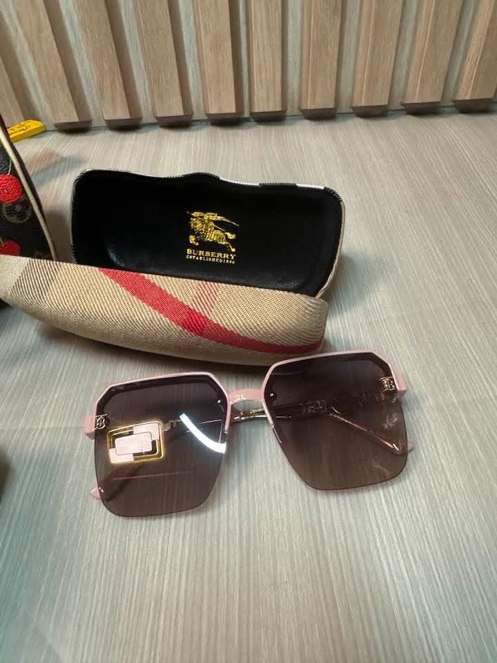 Burberry Pink Square Sunglasses with Case (Category: Sunglasses & Eyewear) located in Manila. Submitted by goodbuying_items0211 (Listing ID 1468892064, Image 2). Description: - Brand: Burberry - Style: Square frames with pink and gold colorway - Lenses: Gradient brown - Details: Gold hardware and iconic 'B' monogram logo on temples - Inclusion: classic check hard case with equestrian knight logo inside - Condition: Excellent / Well-maintained - M