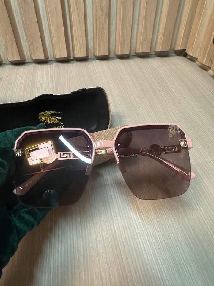 Burberry Pink Square Sunglasses with Case (Category: Sunglasses & Eyewear) located in Manila. Submitted by goodbuying_items0211 (Listing ID 1468892064, Image 3). Description: - Brand: Burberry - Style: Square frames with pink and gold colorway - Lenses: Gradient brown - Details: Gold hardware and iconic 'B' monogram logo on temples - Inclusion: classic check hard case with equestrian knight logo inside - Condition: Excellent / Well-maintained - M
