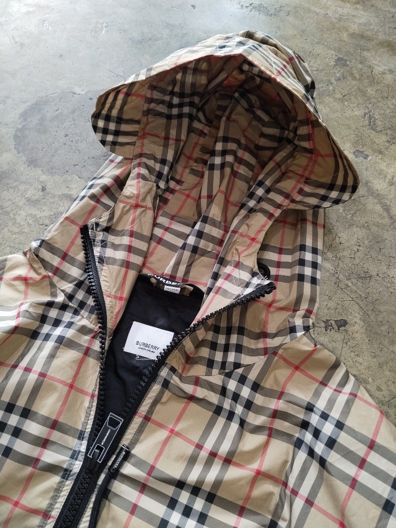Burberry Plaid Parka Hooded Jacket (Category: Coats, Jackets and Outerwear) located in Pasig City. Submitted by loveforlux_2025 (Listing ID 1468791079, Image 2). Description: - Burberry hooded jacket - Iconic vintage check pattern with black inner lining - Full zip closure with branded pull tab - Adjustable drawstrings at the hood and waist - Size: UK 4, US 2, IT 36 - Condition: Clean with clear branding tags at the neck - Mode of Payment: BPI, G
