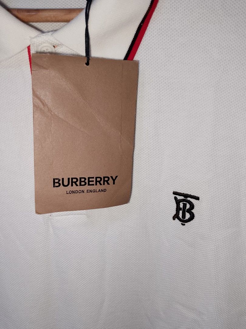 Burberry Polo Longsleeve (Category: Activewear) located in Manila. Submitted by mjthrifted_second (Listing ID 1468734398, Image 3). Description: Authentic Burberry Brand New Condition Size 2XL Dimes 22/28 No Issue .