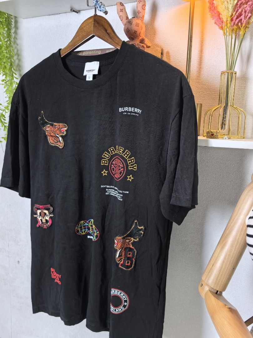 Burberry tshirt (Category: Luxury Apparel) located in Baguio. Submitted by ashzachary (Listing ID 1468865402, Image 2). Description: Burberry tshirt Condition :Excellent condition Color rate 10/10 Size :Medium semi large Inches:W21/L29 No issues No flaws Super ganda sa personal Pm. More details Good quality Plsss 📌No Bogus 📌No return MOP What you see is what you get PALAWAN, CEBUNA GCASH AND BDO Reminder😊 We're selling thrifted clothes so plea
