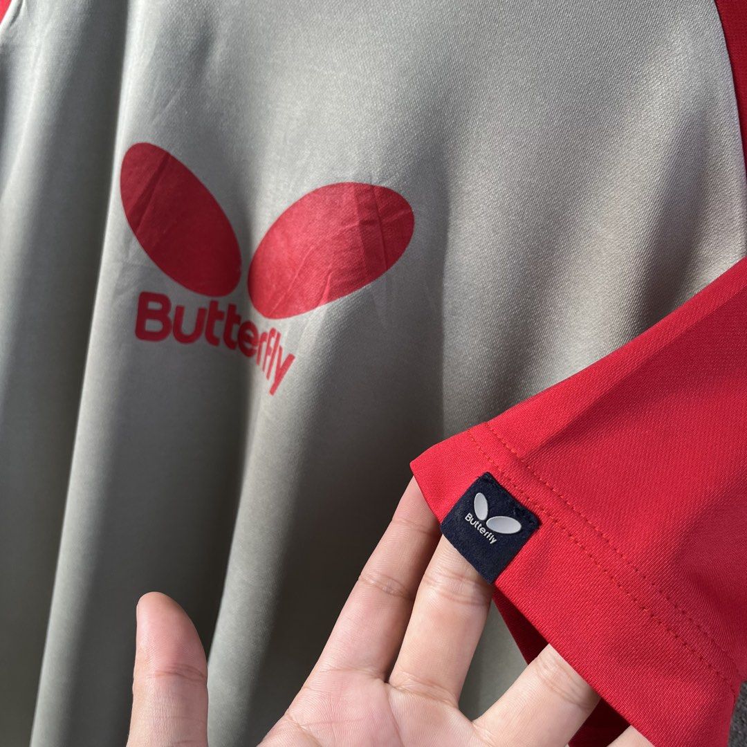 BUTTERFLY RAGLAN TEE (Category: Activewear) located in Manila. Submitted by flippinn (Listing ID 1468802735, Image 2). Description: Cut Neck tag Medium to Large Frame 22.5W 28.5L Excellent, Need wash Lalamove or J&t Express + Shipping fee.