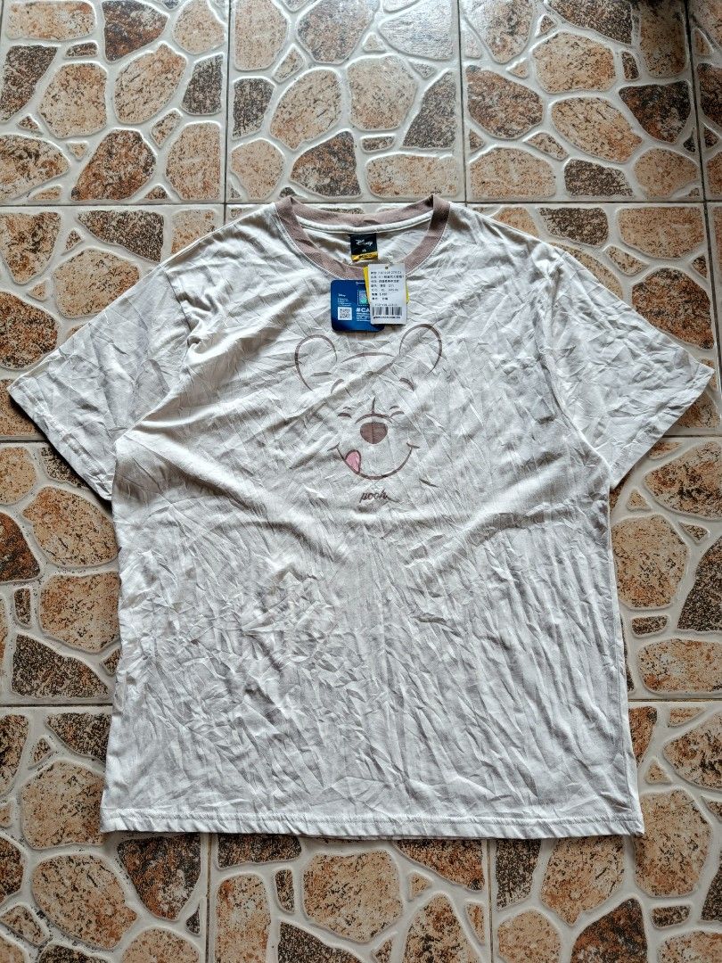CACO DISNEY WINNIE THE POOH TEE (Category: Tshirts & Polo Shirts ) located in Davao. Submitted by thrift.it.denzz (Listing ID 1468835128, Image 1). Description: DISNEY TEE - SIZE XLARGE W21 L28 UNISEX - BRAND NEW CONDITION - NEED WASH - 🏷️500 NEGOTIABLE ADD SHIPPING FEE 📩DM📩.
