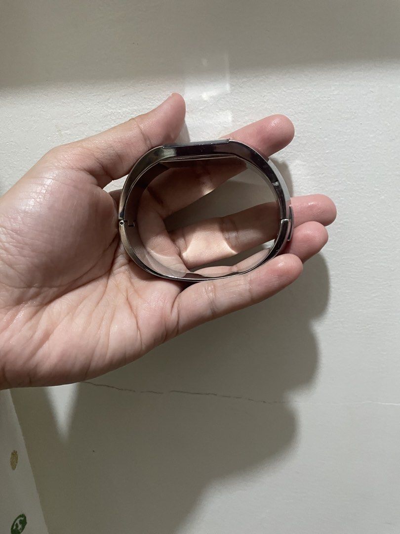 Calvin Klein Bangle Watch with Box (Category: Women's Watches) located in Davao. Submitted by newowl_777 (Listing ID 1468826273, Image 2). Description: - Brand/Model: Calvin Klein - Style: Sleek minimalist stainless steel bangle watch with a chic black face - Inclusions: Original branded presentation box and store tag included - Condition: Minor hairline scratches on the metal surface from handling, otherwise beautiful and fully functional - Perf