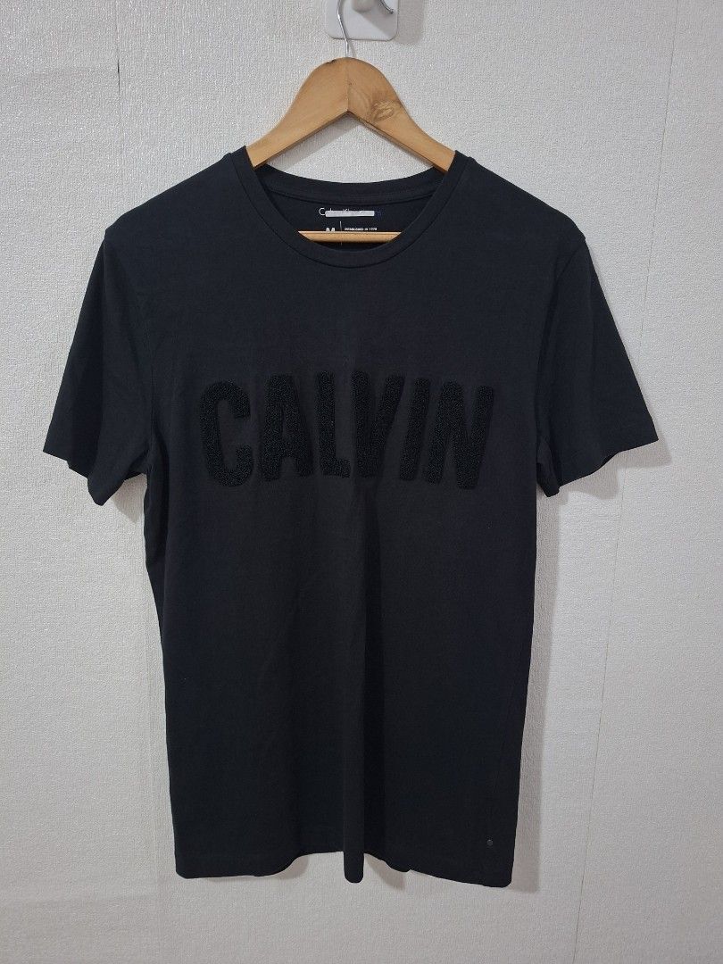 Calvin Klein carpeterized logo shirts (Category: Tshirts & Polo Shirts ) located in Cavite. Submitted by labbudds20 (Listing ID 1468883388, Image 2). Description: Calvin Klein carpeterized logo shirts sample slimfit size medium armpit to armpit 20 inches length 29 inches excellent to new condition see pictures for details.