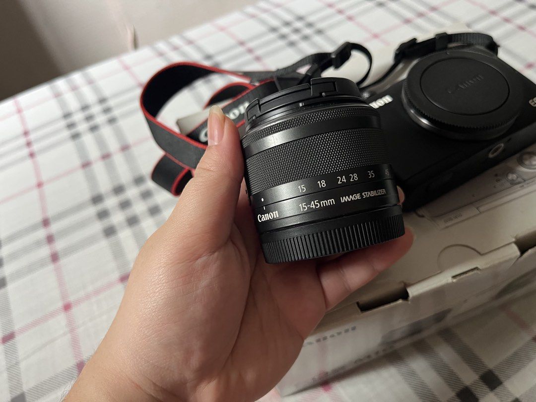 Canon EOS M10 Mirrorless Camera with 15-45mm Lens (Category: Cameras) located in Makati City. Submitted by ojala (Listing ID 1468730488, Image 3). Description: - Canon EOS M10 mirrorless camera body (Black) - EF-M 15-45mm f/3.5-6.3 IS STM zoom lens included - Tilt-up screen great for selfies and vlogging - Compact, lightweight, and user-friendly design - Comes complete with original camera strap, battery charger, and factory box Pefect for travel