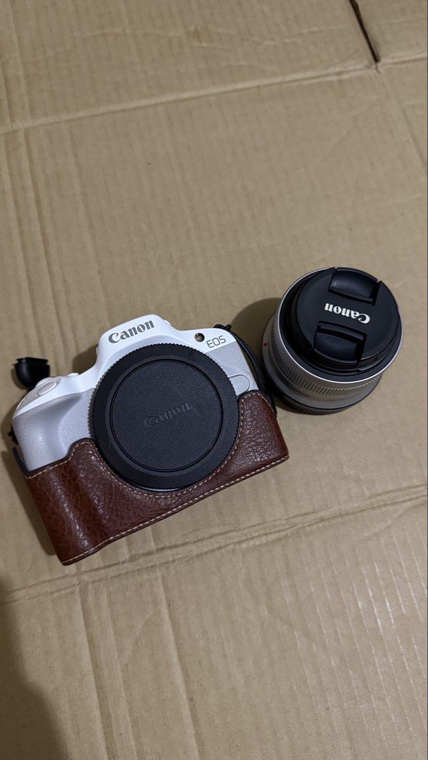 Canon EOS R50 (Category: Cameras) located in Santa Rosa. Submitted by m.adel (Listing ID 1468739574, Image 1). Description: - Model: White Canon EOS R50 mirrorless camera body with included Canon kit lens - Features: Fully articulating flip-out screen, ideal for vlogging and selfies - Condition: Clean exterior body, well-maintained and travel-ready - Ready to use: Complete set with box Rfs: need funds.