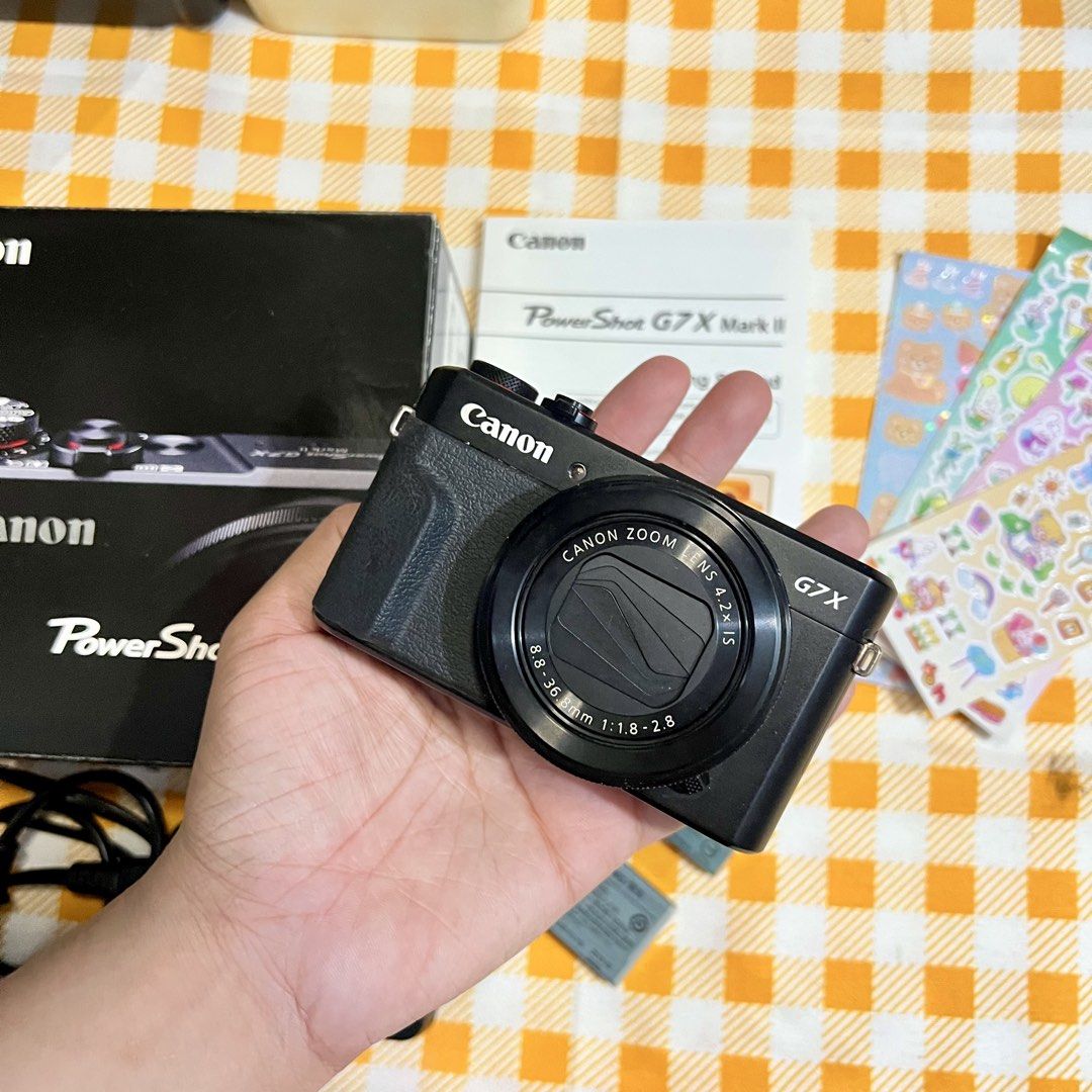 Canon Powershot G7X Mark II (Category: Announcements) located in Makati City. Submitted by CameraHubPH (Listing ID 1468831532, Image 3). Description: ₊˚⊹♡ CANON G7X MARK II ♡⊹˚₊ ✨ INCLUSIONS ✨ ♡ Canon PowerShot G7X Mark II ♡ Original Canon box ♡ Canon battery charger ♡ 2 batteries ♡ Mini tripod / tabletop stand ♡ Getting Started manual ♡ FREE cute coquette stickers 🎀 ୨୧ CAMERA DETAILS ୨୧ ♡ 20.1 MP CMOS sensor ♡ 4.2x optical zoom ♡ Bright f/1.8–2