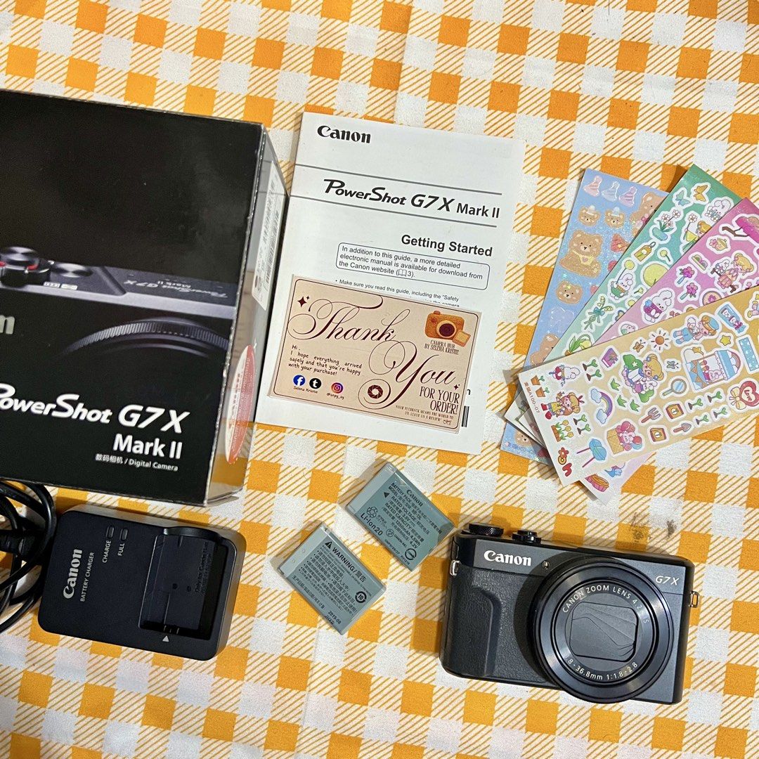 Canon Powershot G7X Mark II (Category: Announcements) located in Makati City. Submitted by CameraHubPH (Listing ID 1468831532, Image 2). Description: ₊˚⊹♡ CANON G7X MARK II ♡⊹˚₊ ✨ INCLUSIONS ✨ ♡ Canon PowerShot G7X Mark II ♡ Original Canon box ♡ Canon battery charger ♡ 2 batteries ♡ Mini tripod / tabletop stand ♡ Getting Started manual ♡ FREE cute coquette stickers 🎀 ୨୧ CAMERA DETAILS ୨୧ ♡ 20.1 MP CMOS sensor ♡ 4.2x optical zoom ♡ Bright f/1.8–2
