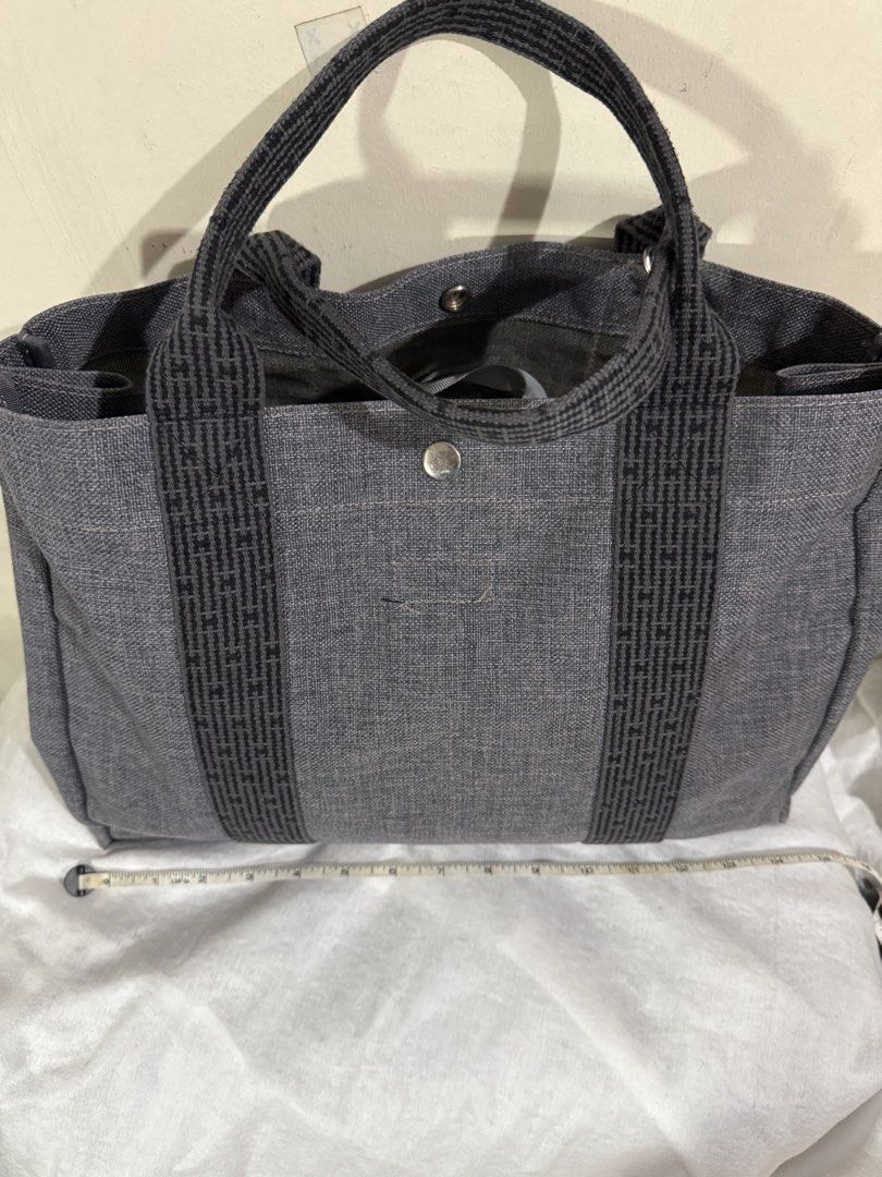 Canvass Tote Bag (Category: Tote Bags) located in Quezon City. Submitted by vluxxe (Listing ID 1468833570, Image 2). Description: Canvass tote bag Can fit laptop up to 14” Good as new Measurement in photos .