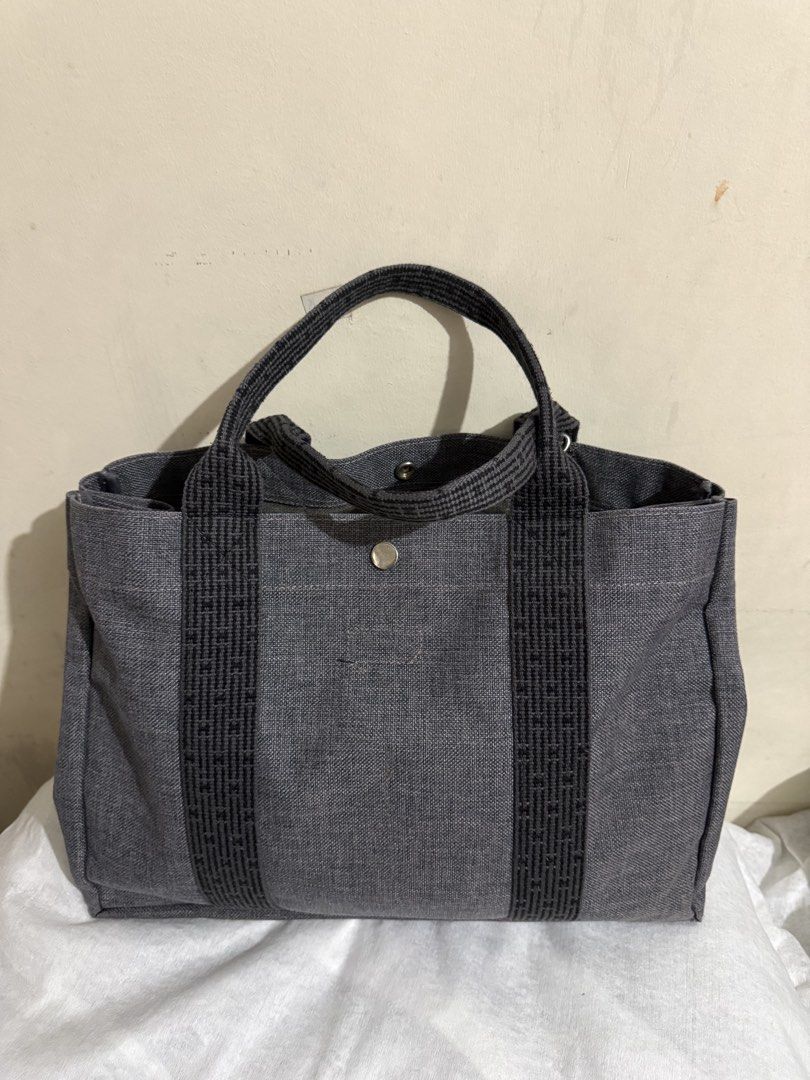 Canvass Tote Bag (Category: Tote Bags) located in Quezon City. Submitted by vluxxe (Listing ID 1468833570, Image 1). Description: Canvass tote bag Can fit laptop up to 14” Good as new Measurement in photos .