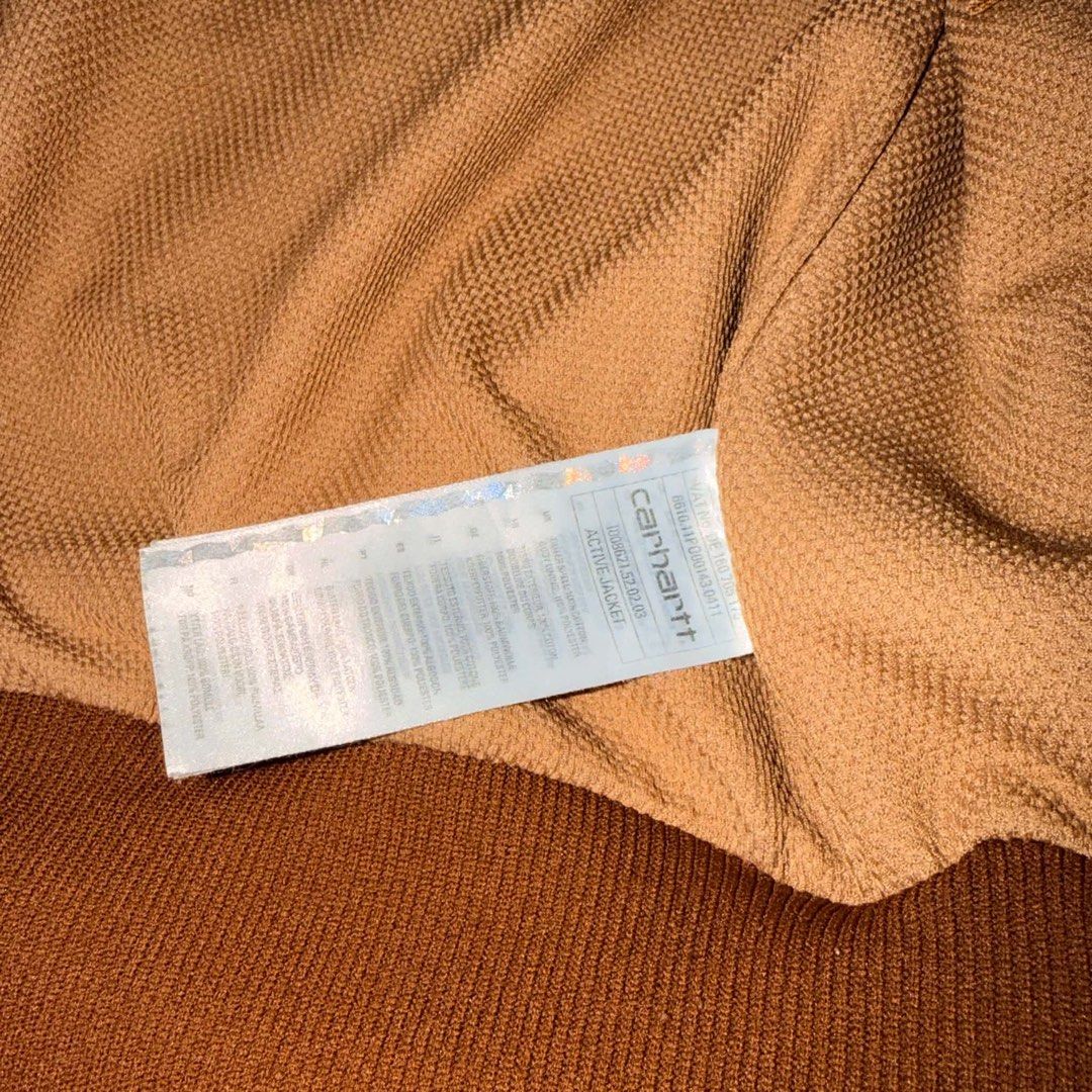 Carhartt Active Jacket Brown Size M (Category: Coats, Jackets and Outerwear) located in Santa Rosa. Submitted by n.vallermosa (Listing ID 1468920100, Image 3). Description: Modern release Active Jacket BRN Size on tag Medium Dimes 22x27 Issues: stains, signs of usage Color rate 9/10 Price 5500 or OBO - Brand: Carhartt - Item: Active Jacket - Color: Classic Brown Duck Canvas - Size: Medium - Lining: Warm thermal lining - Features: Full zip front, 