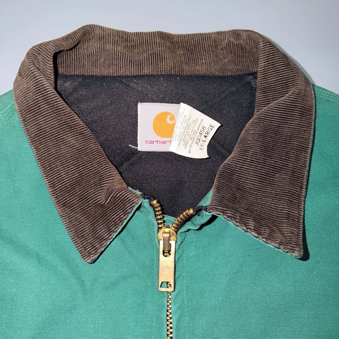Carhartt Aztec Pattern Santa Fe Jacket Green (Category: Coats, Jackets and Outerwear) located in Santa Rosa. Submitted by n.vallermosa (Listing ID 1468920187, Image 2). Description: JQ0458 aztec santa fe green Size on tag Xxl Dimes 27x29 Issue : signs of usage Price 39000 or OBO - Brand/Model: Carhartt JQ0458 duck canvas jacket - Color: Teal green with iconic Aztec pattern across chest and sleeves - Details: Classic brown corduroy collar, brass z
