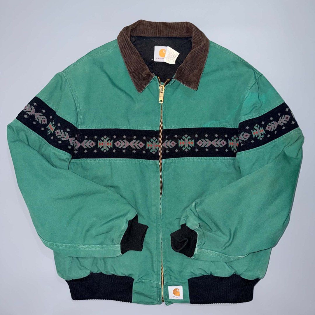 Carhartt Aztec Pattern Santa Fe Jacket Green (Category: Coats, Jackets and Outerwear) located in Santa Rosa. Submitted by n.vallermosa (Listing ID 1468920187, Image 1). Description: JQ0458 aztec santa fe green Size on tag Xxl Dimes 27x29 Issue : signs of usage Price 39000 or OBO - Brand/Model: Carhartt JQ0458 duck canvas jacket - Color: Teal green with iconic Aztec pattern across chest and sleeves - Details: Classic brown corduroy collar, brass z