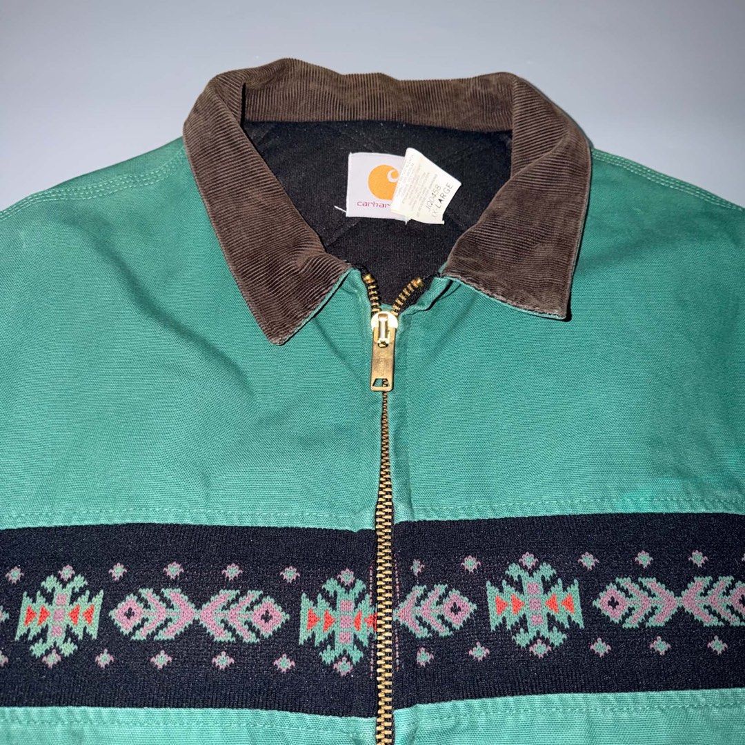 Carhartt Aztec Pattern Santa Fe Jacket Green (Category: Coats, Jackets and Outerwear) located in Santa Rosa. Submitted by n.vallermosa (Listing ID 1468920187, Image 3). Description: JQ0458 aztec santa fe green Size on tag Xxl Dimes 27x29 Issue : signs of usage Price 39000 or OBO - Brand/Model: Carhartt JQ0458 duck canvas jacket - Color: Teal green with iconic Aztec pattern across chest and sleeves - Details: Classic brown corduroy collar, brass z