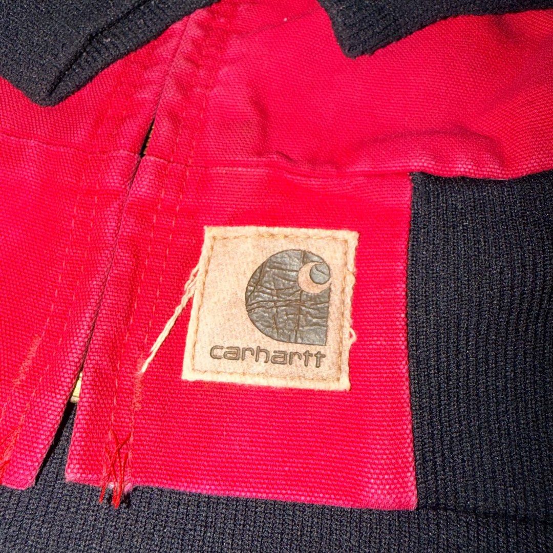 Carhartt Aztec Patterned Hooded Zip Activr Jacket (Category: Coats, Jackets and Outerwear) located in Santa Rosa. Submitted by n.vallermosa (Listing ID 1468920142, Image 3). Description: J78 red aztec active Medium 22.5x27 Issues: signs of usage, expired patch, scratch on left ribbings Price 45000 or obo - Brand: Carhartt - Color: Bright red with black Aztec pattern stripe - Material: Heavy cotton canvas with quilted black lining - Features: Full