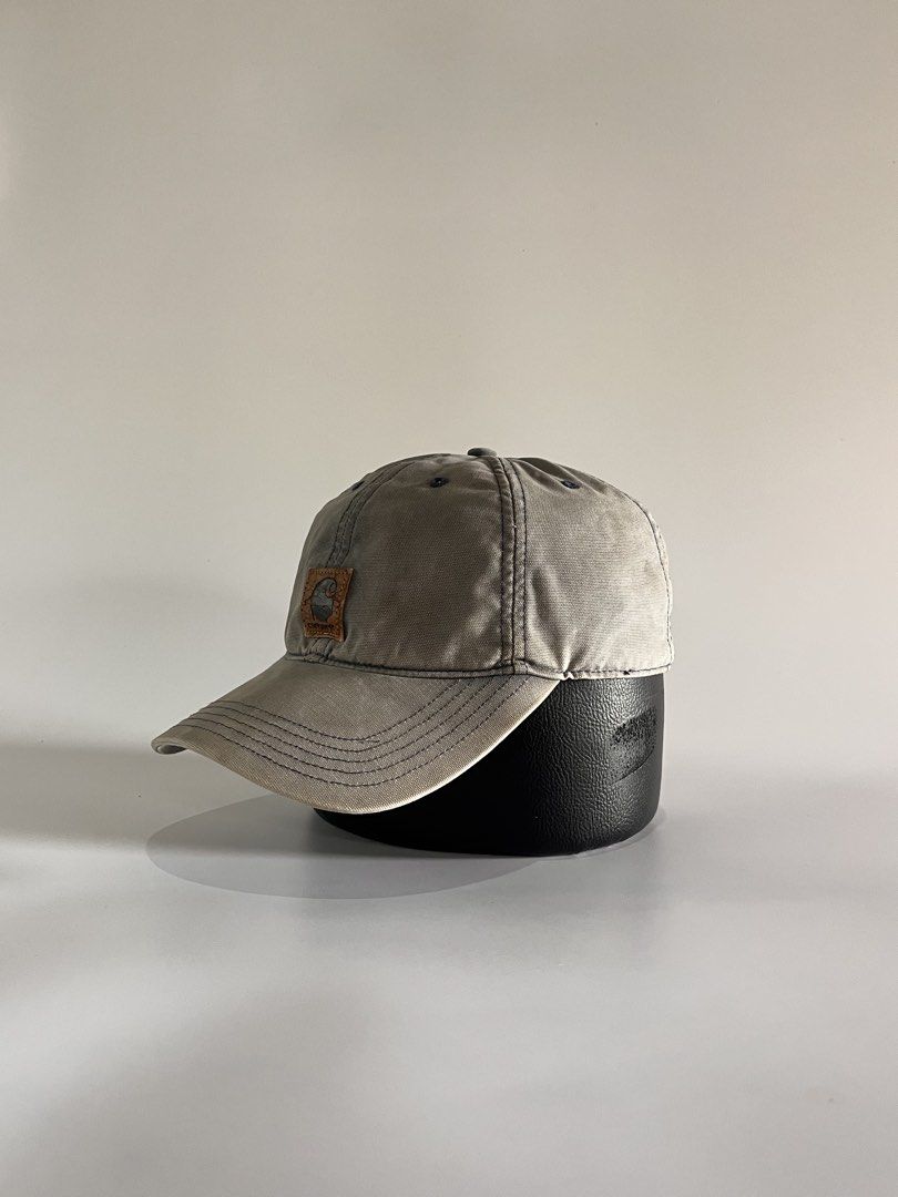 Carhartt dadhat (Category: Caps & Hats) located in Malaybalay. Submitted by haulsome (Listing ID 1468849934, Image 2). Description: Carhartt Dadhat -In beautiful, rugged condition -Features a classic Carhartt leather patch up front and embroidered spell out Carhartt at the strap -Has sun fade, leather patch is broken, and has multiple stain -Adult size, adjustable velcro 350php, +sf.