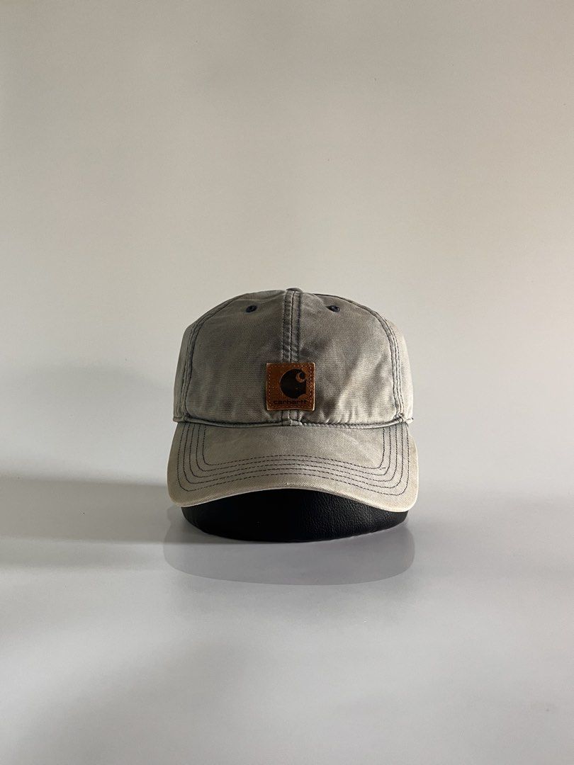 Carhartt dadhat (Category: Caps & Hats) located in Malaybalay. Submitted by haulsome (Listing ID 1468849934, Image 1). Description: Carhartt Dadhat -In beautiful, rugged condition -Features a classic Carhartt leather patch up front and embroidered spell out Carhartt at the strap -Has sun fade, leather patch is broken, and has multiple stain -Adult size, adjustable velcro 350php, +sf.