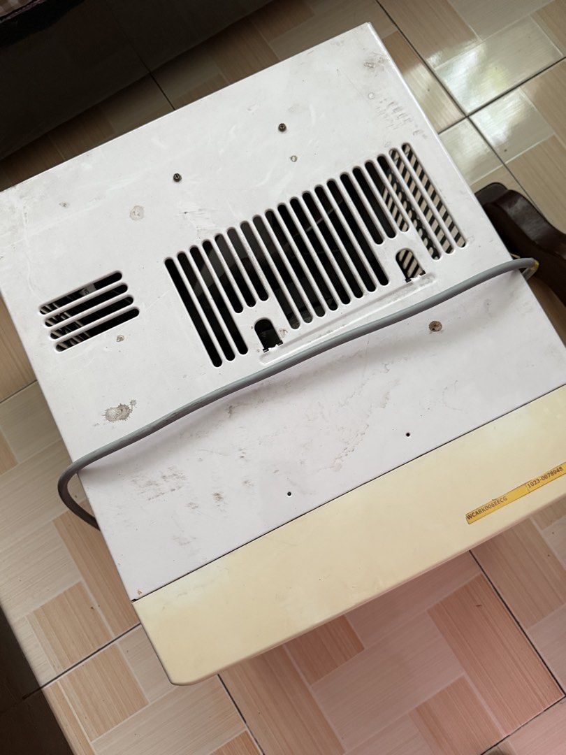 Carrier Window Type Air Conditioner (Category: Air Conditioning and Heating) located in Quezon City. Submitted by llito29 (Listing ID 1468776879, Image 3). Description: - L: 18.5 in W: 20.5 in H: 14 in - Brand/Model: Carrier Window Type AC (WCARK006EECG) - Power: 230V, 60Hz - Cooling Capacity: 1.67 kW - Features: Digital control panel, timer, multiple mode and fan buttons - Cosmetic Condition: White casing with some dirt marks on top and slight y