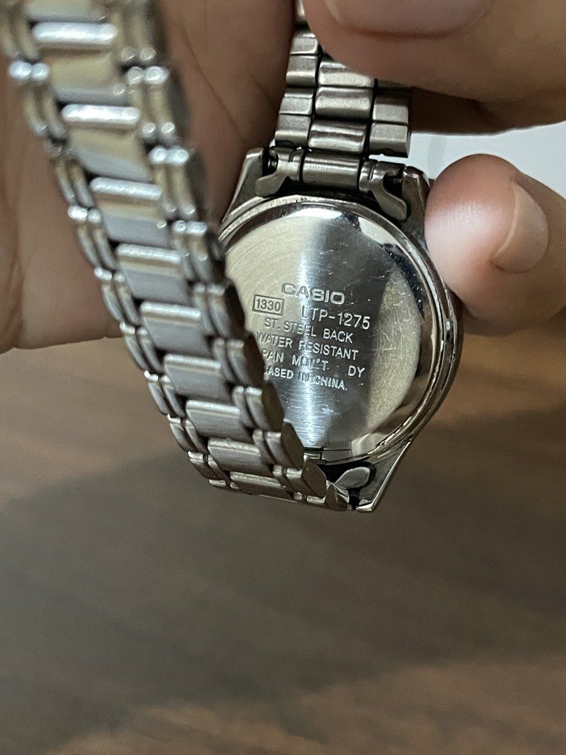 Casio LTP-1275 1330 Quartz Analog Watch (Category: Women's Watches) located in Angeles City. Submitted by hao.ming (Listing ID 1468918955, Image 3). Description: - Brand: Casio LTP-1275 1330 - Originally bought in UAE - Quartz (Battery operated) - Material: Silver-tone stainless steel case and band - Clean white dial with simple hour markers - Water-resistant back, standard deployment clasp - Works great, barely used, and in excellent working con