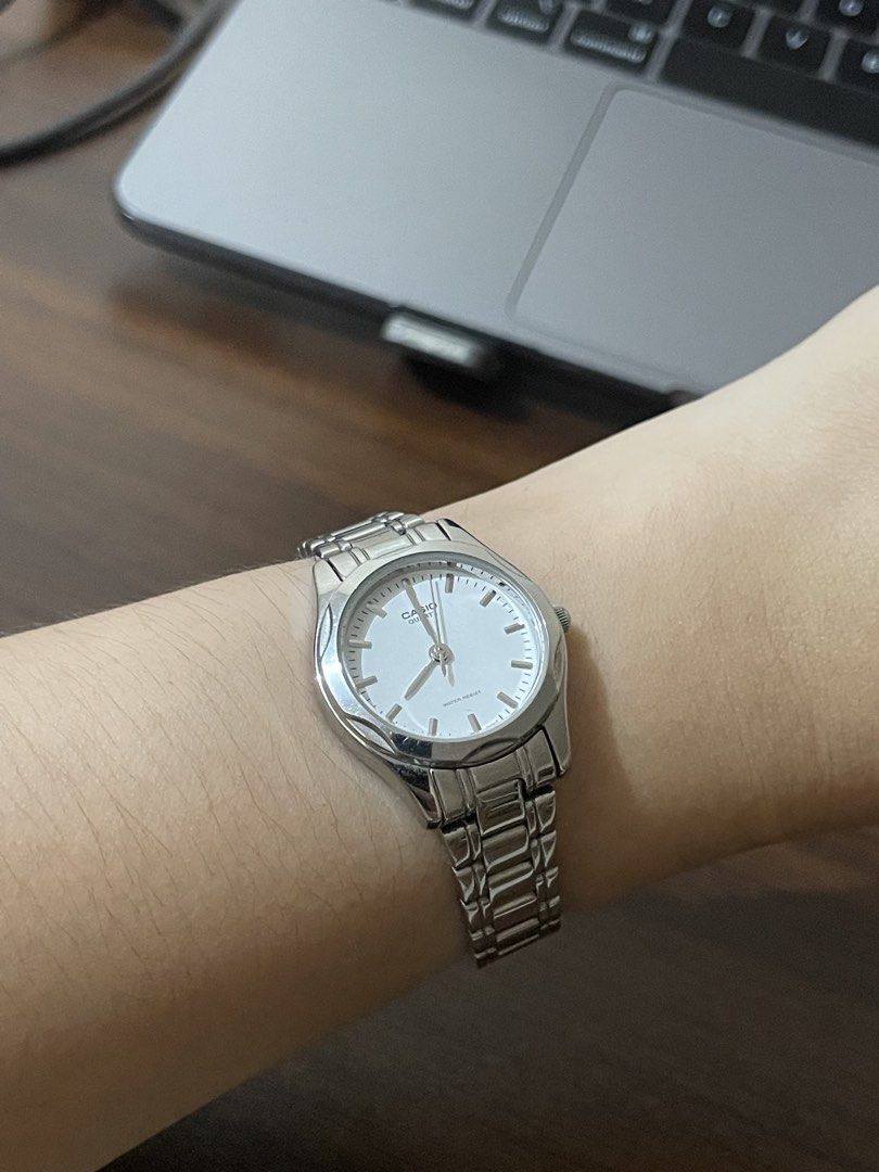 Casio LTP-1275 1330 Quartz Analog Watch (Category: Women's Watches) located in Angeles City. Submitted by hao.ming (Listing ID 1468918955, Image 2). Description: - Brand: Casio LTP-1275 1330 - Originally bought in UAE - Quartz (Battery operated) - Material: Silver-tone stainless steel case and band - Clean white dial with simple hour markers - Water-resistant back, standard deployment clasp - Works great, barely used, and in excellent working con