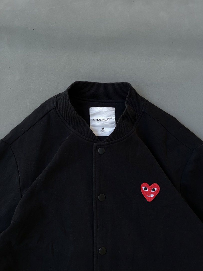 Cdg Play Jacket (Category: Activewear) located in Malasiqui. Submitted by blank_wave (Listing ID 1468778148, Image 3). Description: M on tag repaired part on sleeve, minor scratch 9.5/10 color rate 22x26 good condition.