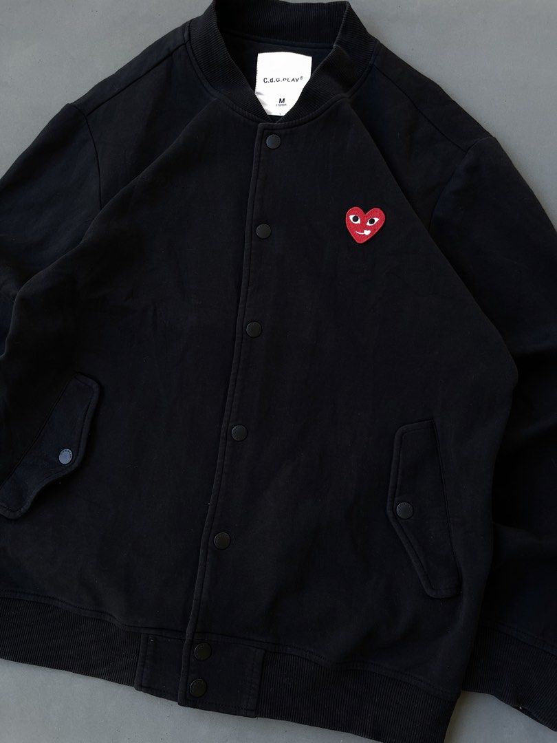 Cdg Play Jacket (Category: Activewear) located in Malasiqui. Submitted by blank_wave (Listing ID 1468778148, Image 2). Description: M on tag repaired part on sleeve, minor scratch 9.5/10 color rate 22x26 good condition.