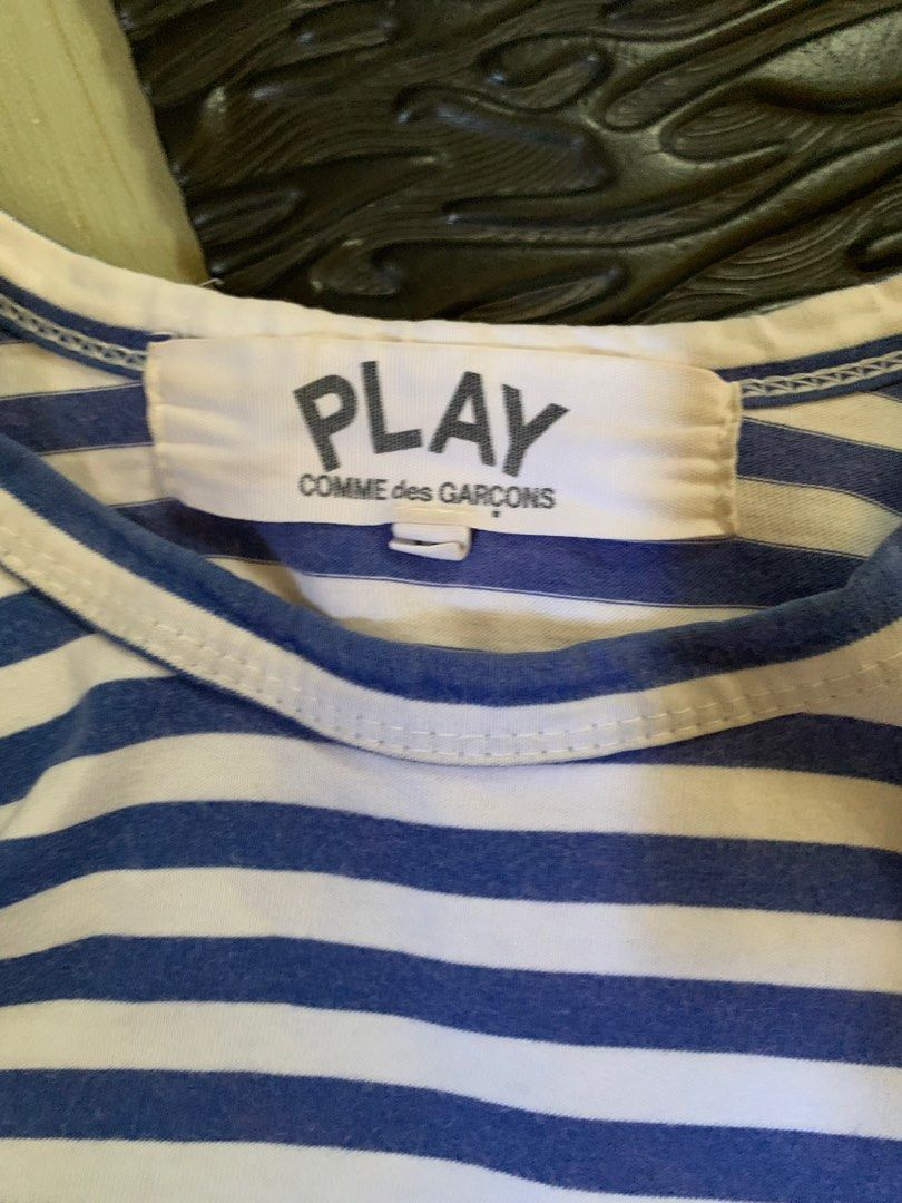 Cdg play tee (Category: Tshirts & Polo Shirts ) located in Manila. Submitted by _blessmeo (Listing ID 1468776091, Image 3). Description: 20 width 22 length s on tag embroid heart stain & discoloration .