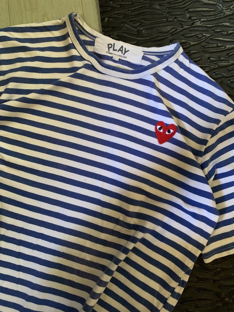 Cdg play tee (Category: Tshirts & Polo Shirts ) located in Manila. Submitted by _blessmeo (Listing ID 1468776091, Image 2). Description: 20 width 22 length s on tag embroid heart stain & discoloration .