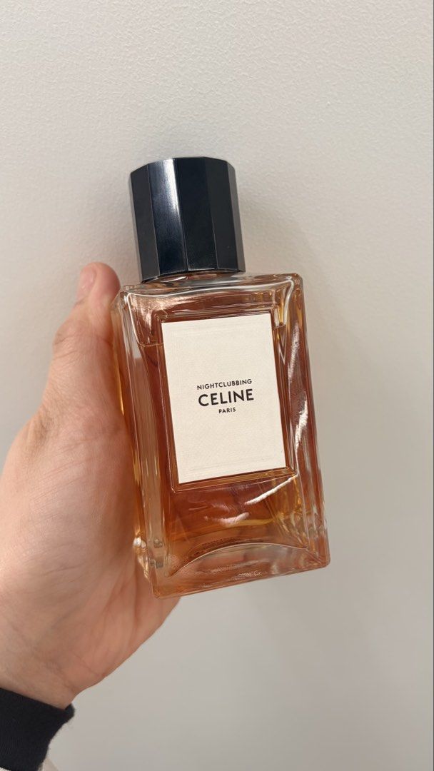 Celine Nightclubbing Eau de Parfum 100ML (Category: Fragrance & Deodorants) located in Paranaque City. Submitted by aacc0920 (Listing ID 1468730946, Image 1). Description: - Authentic Celine Nightclubbing perfume bottle only (no box) - Scent profile: Powdery, iris, green, earthy, vanilla, mossy, woody, balsamic, aromatic, and musky - Distinctive design featuring amber liquid and a modern black geometric cap - 100ml.