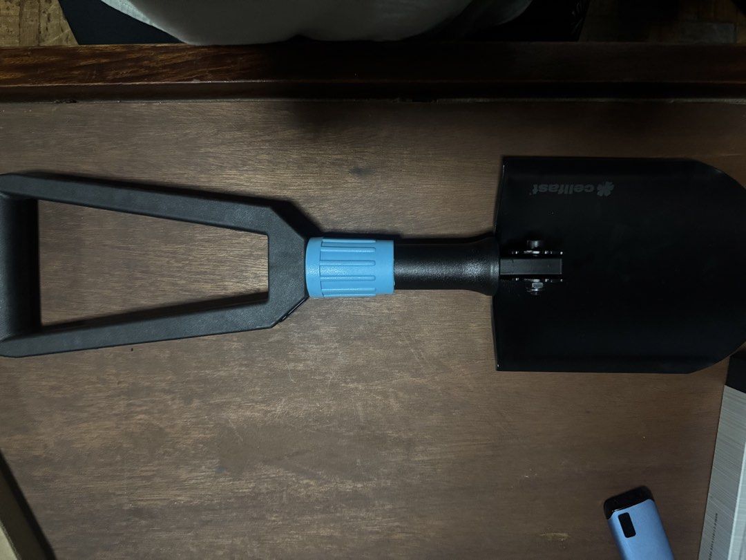 Cellfast Folding Shovel Camping Tool with Pouch (Category: Hiking & Camping) located in Valenzuela. Submitted by piayap14 (Listing ID 1468884800, Image 2). Description: - Brand/Model: Cellfast Folding Shovel - Color: Black and blue - Design: Compact, folds down small with easy locking mechanism - Materials: Durable metal blade and sturdy plastic handle - Inclusion: Matching black storage pouch with brand logo - Best for: Camping, gardening, and c