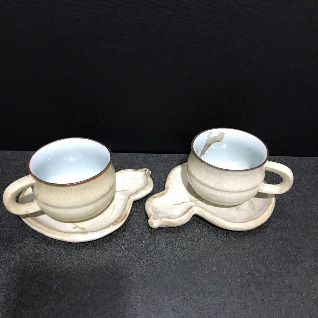 Ceramic Teacup and Gourd Shaped Saucer Set (Category: Coffee & Tea Tableware) located in Baao. Submitted by all.things.japan (Listing ID 1468747994, Image 1). Description: - Set includes: 2 ceramic teacups and matching gourd-shaped saucers - Design: Beige textured exterior with a glossy white interior and stylish brown rims - Aesthetic: Unique handmade style, perfect for everyday use or aesthetic table settings - Ideal for: Afternoon tea, coffee,