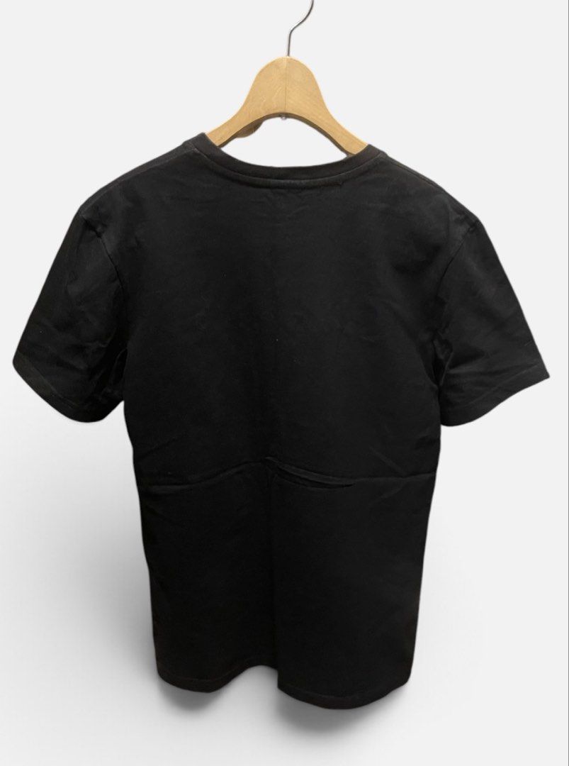 Champion Black Script Logo Embroidered T-Shirt (Category: Shirts) located in San Pedro. Submitted by lifebeginsaftercoff33 (Listing ID 1468817638, Image 3). Description: - Authentic black Champion t-shirt - Dimes: 18 x 26 in - Large embroidered script logo across the chest - Signature small 'C' patch embroidered on the left sleeve - Comfortable crew neck with branded inner taping - Classic fit, perfect for casual streetwear - Clean condition with