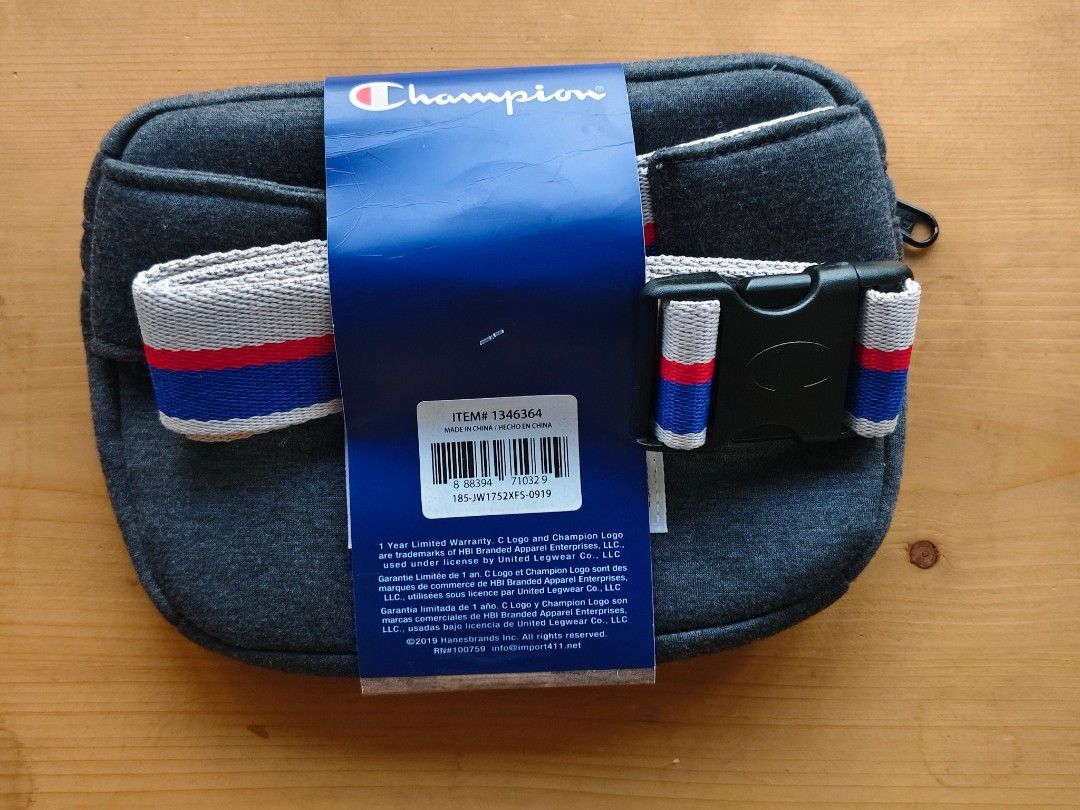 Champion Multi Purpose Belt Bag (Category: Belt bags, Clutches and Pouches) located in Paranaque City. Submitted by shopcadescloset (Listing ID 1468813894, Image 2). Description: - Authentic Champion multi-purpose belt bag - Dark grey melton-style fabric - Adjustable strap with iconic red, white, and blue stripes - Dual safety plastic buckle for extra security - Secure zippered main compartment - Embroidered Champion logo patch on the front - Bra