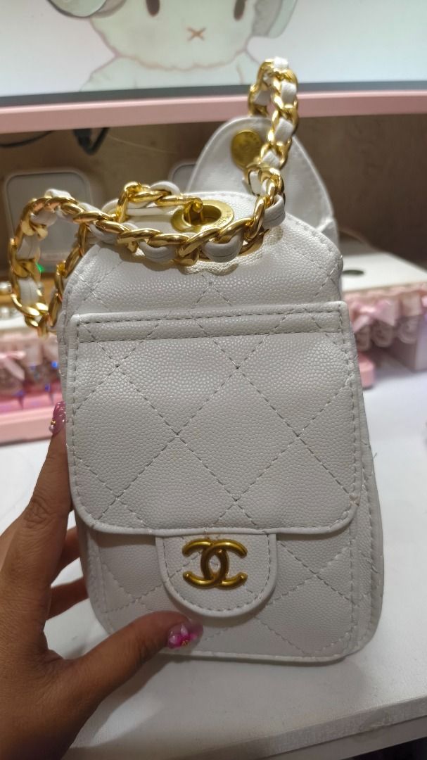 Chanel bucket bag mini in white (Category: Luxury Bags & Wallets) located in Caloocan City. Submitted by arkiascloset (Listing ID 1468851673, Image 2). Description: COD is available around metro manila only No Flaws brand new Location: Sta. Lucia, Nova. QC.