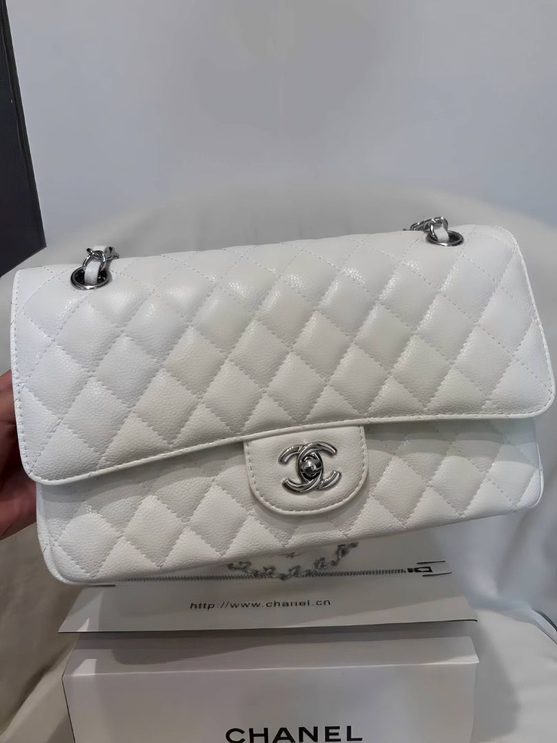Chanel Classic Double Flap White (Category: Luxury Bags & Wallets) located in Las Pinas. Submitted by moonlaight (Listing ID 1468875535, Image 1). Description: Condition: Almost brand new Size: Medium Comes with the box and dust bag!.