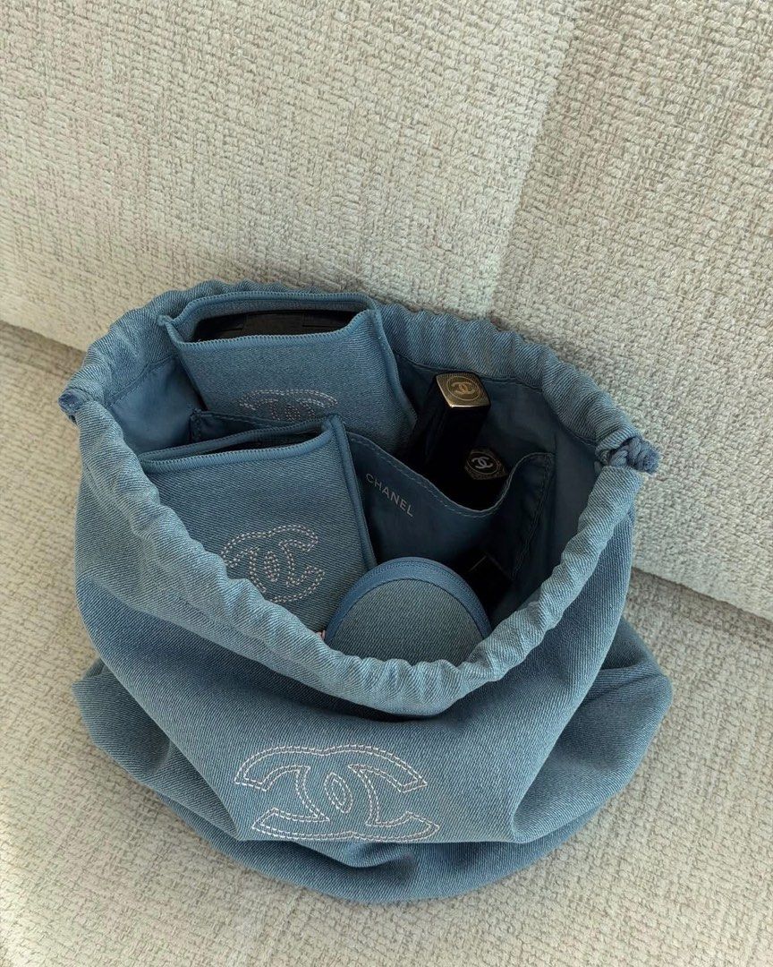 Chanel Denim Blue Drawstring Bag Pouch (Category: Purses & Pouches) located in Taytay. Submitted by angeltyyyy (Listing ID 1468729516, Image 1). Description: authentic, complimentary gift from chanel 🫶🏻 simple and chic bag for everyday use ✨ loc: Commonwealth, QC (can also ship from Taytay, Pasay, and Clark, Pampanga based on sched).