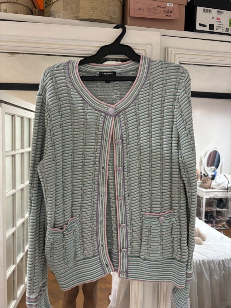 CHANEL Knit Cardigan (Category: Coats, Jackets and Outerwear) located in Makati City. Submitted by bravelion-b2bc (Listing ID 1468907706, Image 2). Description: - Brand: CHANEL - Style: Pastel multicolor stripe knit cardigan as seen on Jennie - Details: Round neckline, button front closure, front patch pockets - Material: Soft ribbed knit throughout - Authenticity: Features iconic CC logo tag inside near the collar - Condition: Excellent luxury p