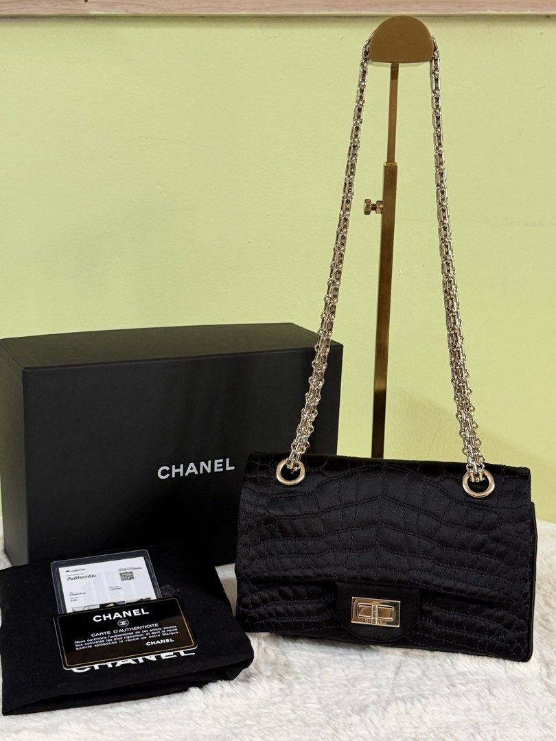Chanel Reissue Small black (Category: Luxury Bags & Wallets) located in Manila. Submitted by rellamaaim07341 (Listing ID 1468884266, Image 1). Description: Black Quilted Satin Embossed Crocodile 2.55 Small ‼️Rank A‼️ Series 12 Comes with Dust bag,Card Holo Intact .