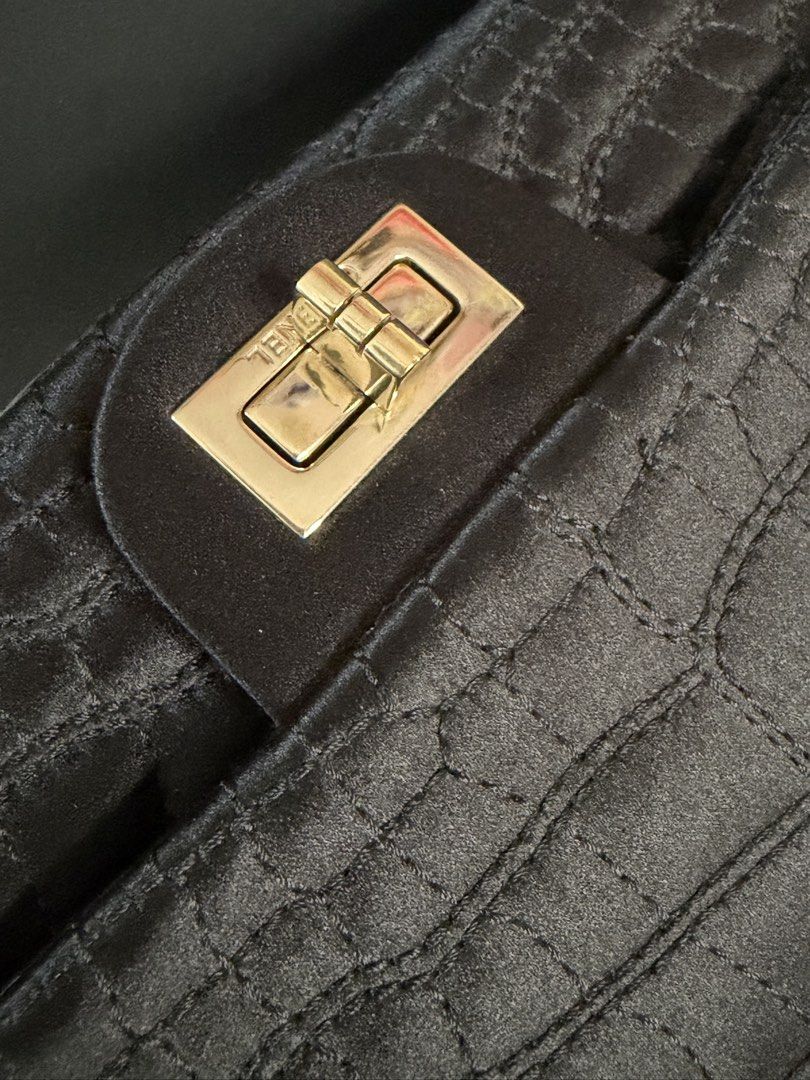 Chanel Reissue Small black (Category: Luxury Bags & Wallets) located in Manila. Submitted by rellamaaim07341 (Listing ID 1468884266, Image 3). Description: Black Quilted Satin Embossed Crocodile 2.55 Small ‼️Rank A‼️ Series 12 Comes with Dust bag,Card Holo Intact .
