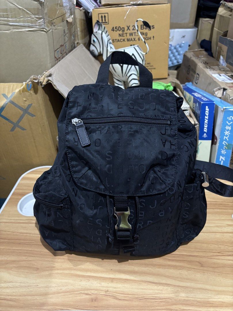 CHARLES JOURDAN Logo Backpack (Category: Backpacks) located in Calamba. Submitted by alnsurplus.028 (Listing ID 1468733610, Image 1). Description: CHARLES JOURDAN Logo Backpack black Charles Jourdan monogram nylon backpack with a front flap buckle and zip pocket Like new condition No issue We ship nationwide Lalamove/J&T Loc: Calamba, Laguna.