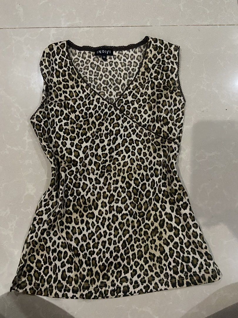 cheetah print top (Category: Sleeveless) located in Pagadian. Submitted by jellsnow (Listing ID 1468810579, Image 1). Description: free sf if 2+ items loc: pagadian city.