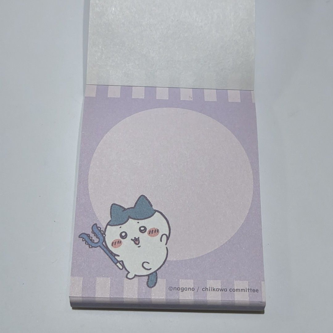 Chiikawa Notepad memo pad official merchandise Light Blue (Category: Stationery & School Supplies) located in Manila. Submitted by abbey.lee (Listing ID 1468900946, Image 2). Description: - Authentic Chiikawa & Kuriboh fantasy costume design - Official Nagano merchandise - Beautiful purple cover - Lined pages featuring cute tiny stars and character art at the top - Perfect for daily notes, journaling, or collecting.