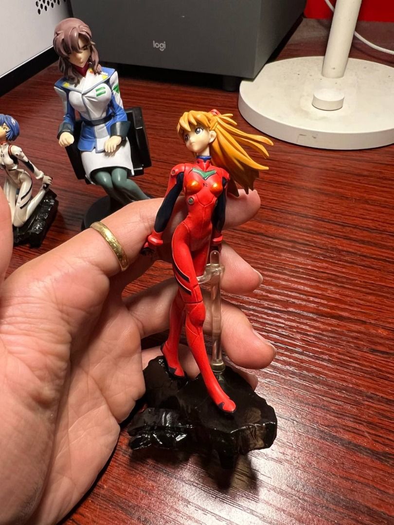 Chix Anime Figurine Set (Category: Figurines & Statues) located in Baguio. Submitted by ditoyzb08176 (Listing ID 1468856814, Image 2). Description: - Set of 3 Neon Genesis Evangelion anime figures - Includes Rei Ayanami kneeling on base, Misato Katsuragi sitting in chair, and Asuka Langley in red plugsuit on rock base - Great for shelf display and collection - Sold as set' Location: Baguio City Shipping: J&T/FLASH/LBC .